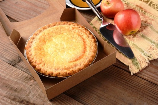 Apple Pie with Fresh Apples on Wood Table