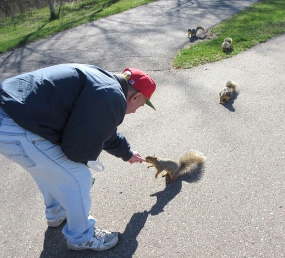 MIKE FEEDING SQUIRRELS